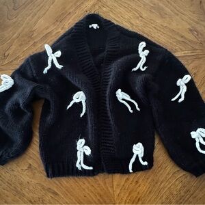 Stylish Black Cardigan with White Bow Details